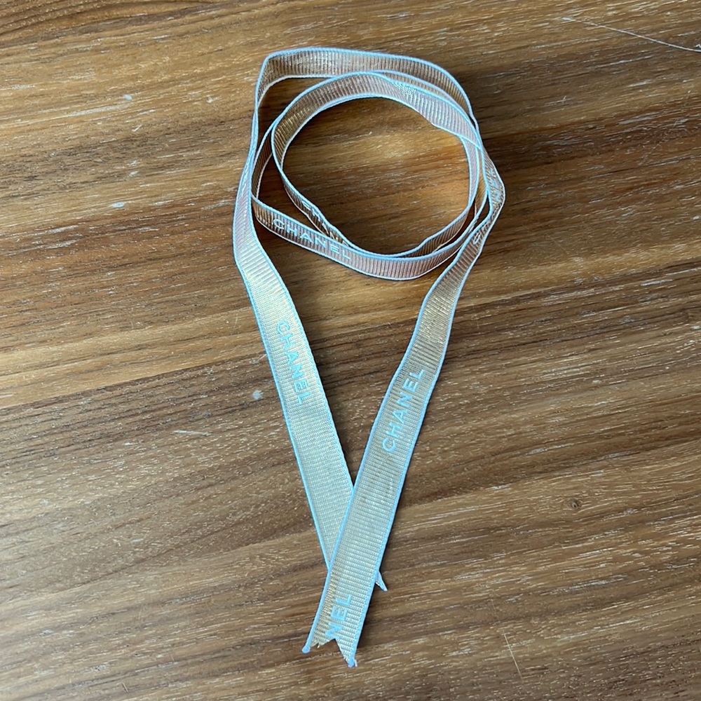 CHANEL gold ribbon
